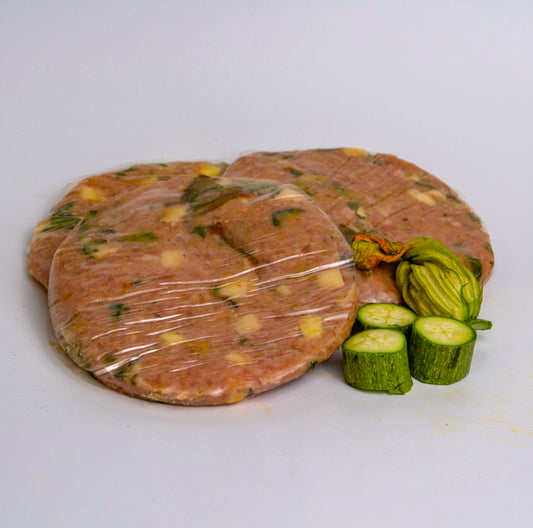 Hamburger di pollo con zucchine, fiori di zucca e provola