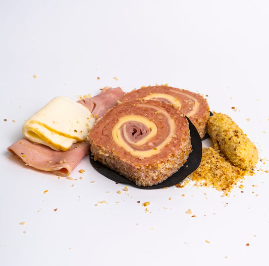 Fetta di polpettone di pollo con prosciutto e provola