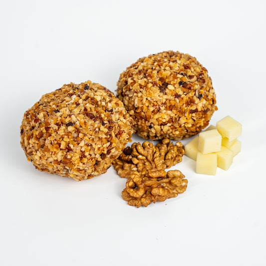 Rocher di carne con salsa alle noci, noci tirate, speck e provola